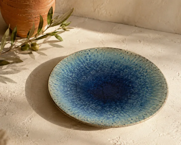 Coupe Salad Plate in Tidepool Blue — reactive blue glaze coupe.