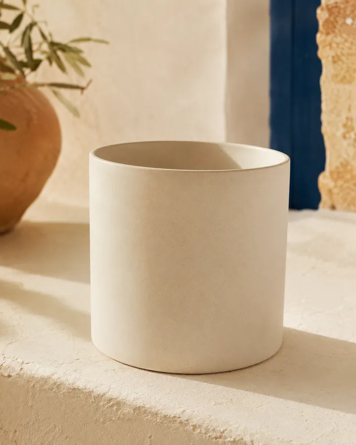 Cylinder Modern Planter in Matte Bone finish.