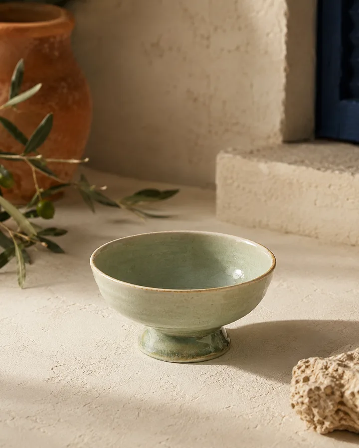 Footed Dessert Bowl in Pistachio Cream glaze.