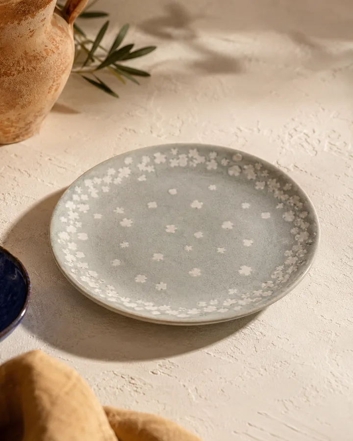 Wax-Resist Side Plate in Sea Salt — grey glaze with white crystal motifs.