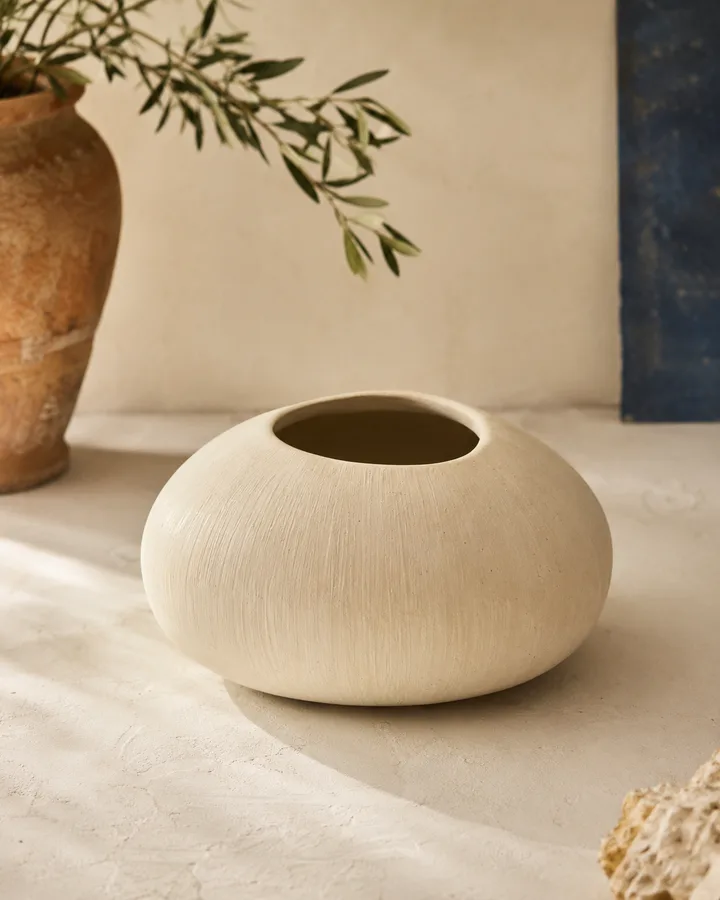Wide-Mouth Pebble Vase in Bleached Linen — cream stoneware pebble vase.